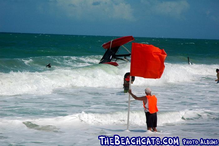 Team Lupe Tortilla Flying Phantom Gets Rolled in the Surf photo copyright TheBeachcats.com