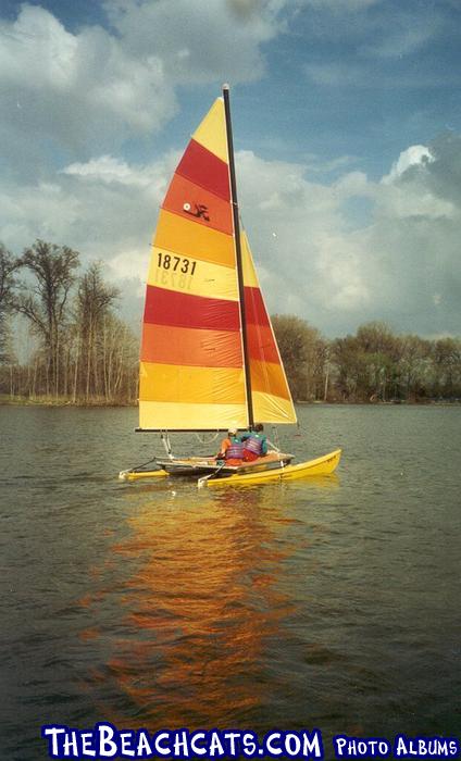 Our second sailing.  Full sails, but no plugs in the hulls.