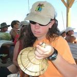 Emily Vaughan checking out her trophy