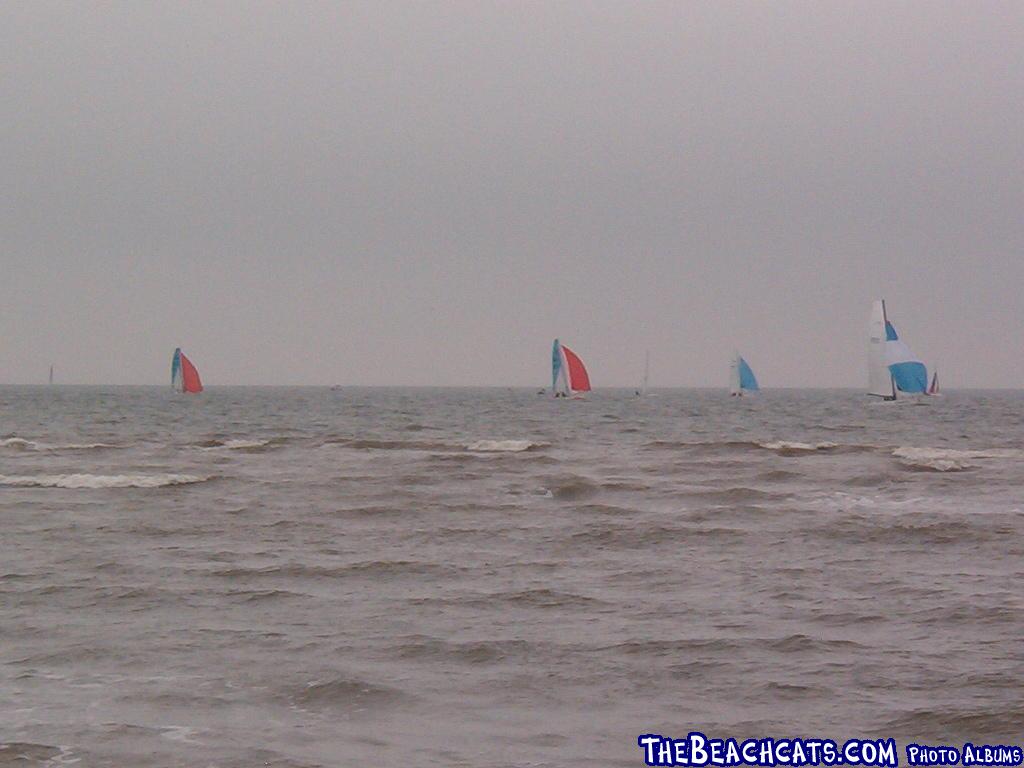 A Roberts 27 (On the left) chased by two Nacra F18s.