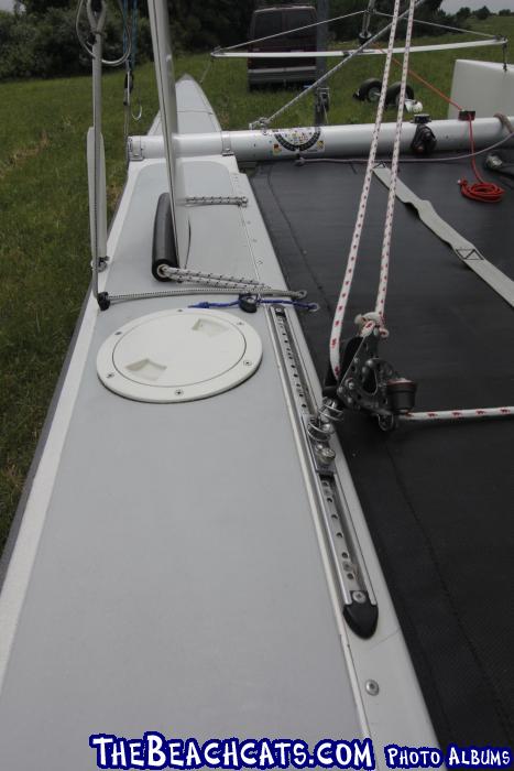 Inspection port for repair of tail of daggerboard trunk on a Nacra