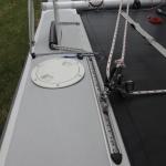 Inspection port for repair of tail of daggerboard trunk on a Nacra