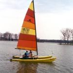 First sail on our 1976 Hobie 16.  Reefed main and no jib.  The wind was strong and we still managed to do a violent pitchpole.