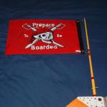 You just have to have a Pirate flag (mounts to the top of the sail headboard)