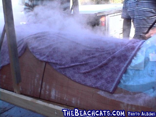 pic023-Steam the hull with towels and boiling water.