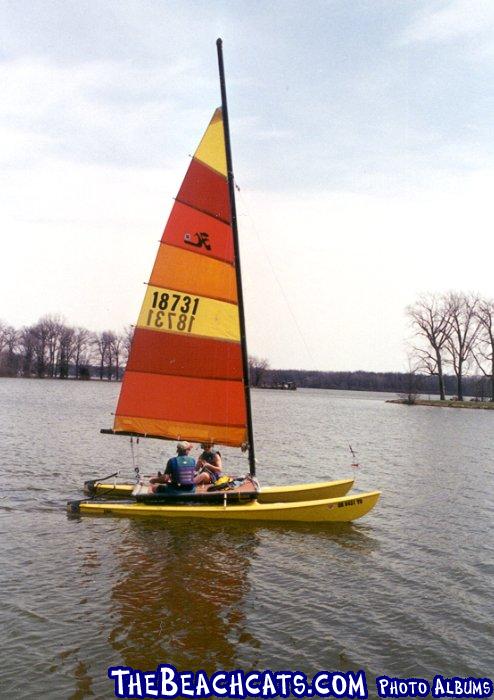 First sail on our 1976 Hobie 16.  Reefed main and no jib.  The wind was strong and we still managed to do a violent pitchpole.