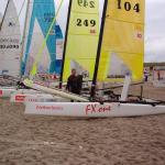 A picture of a very cold me just before launching of the beach, behind me is another FX-One sailed by two clubmates.