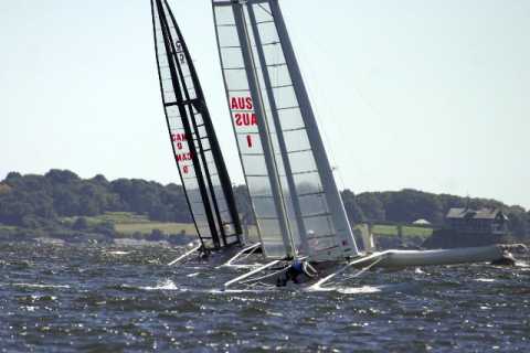 Australians Glenn Ashby and Jimmy Spithill battling it out in Narragansett Bay against Canadian Defenders Fred Eaton and Magnus Clarke. PHOTO  by Trixie Wadson. 